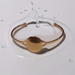 10/ $10 New Gold Tone Open Cuff Bracelet with Round Center Plate